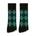 Pair of black and green argyle patterned socks on a beige background