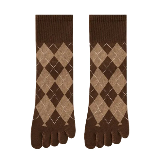 Pair of brown argyle patterned socks on a beige background