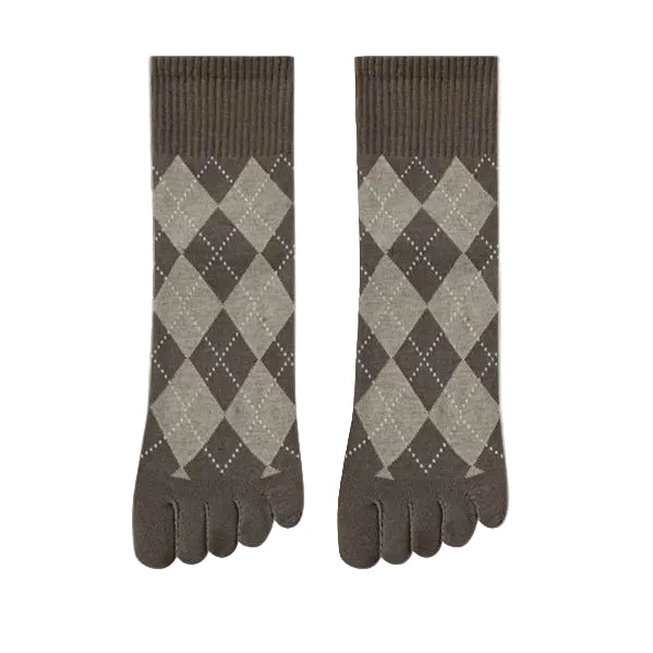 Pair of gray argyle patterned toe socks on a beige background
