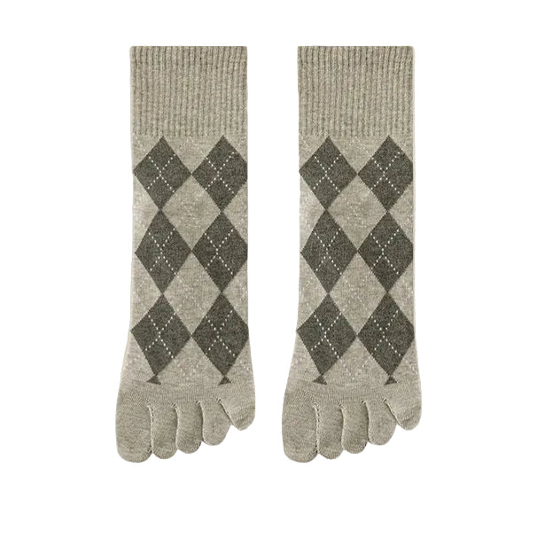 Pair of gray argyle patterned toe socks on a beige background