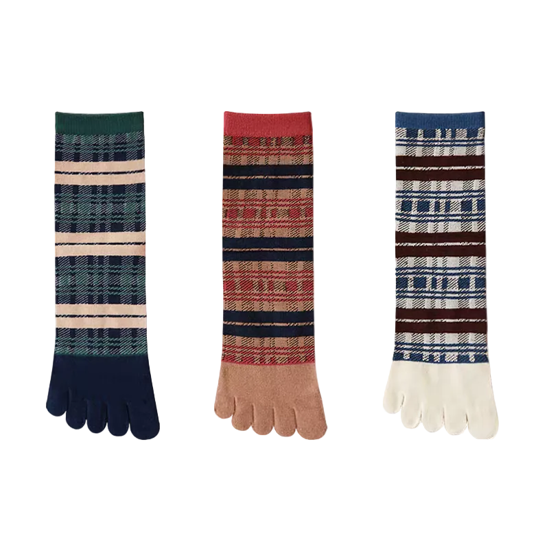 Three pairs of men's toe socks with plaid patterns are shown on a white background. The left pair is dark green and navy, the middle pair is red and navy, and the right pair is blue and white.