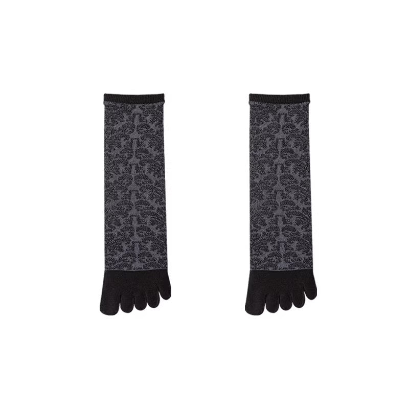 Pair of black and gray patterned five-finger socks on a white background