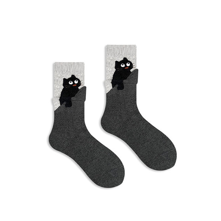 Gray socks with black cat design on a white background