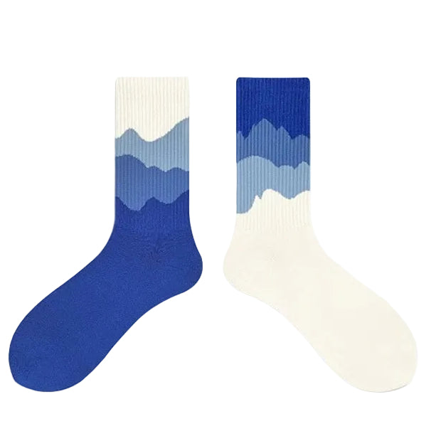 Two socks with blue and white pattern on a white background
