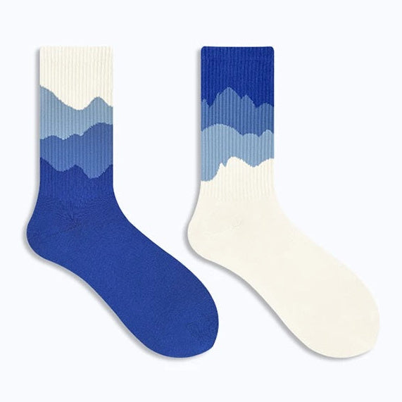 Two socks with blue and white gradient pattern 