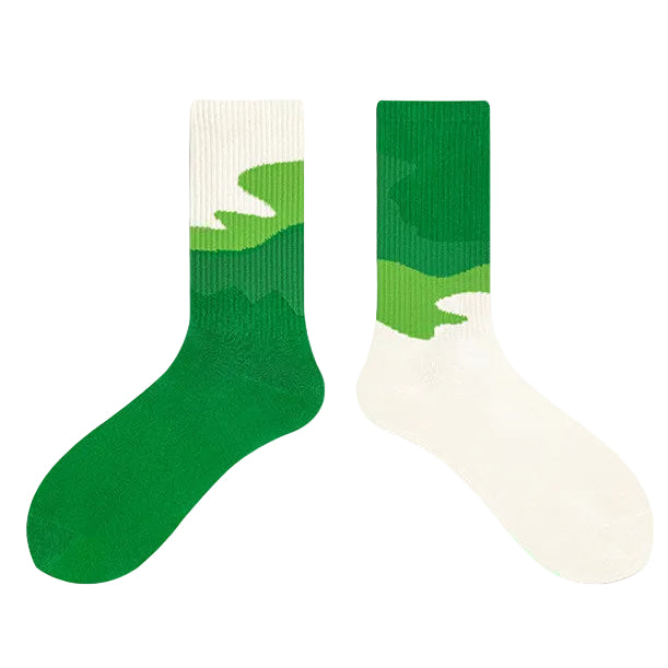 Green and white socks on a white background