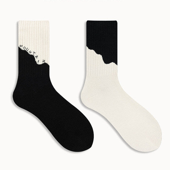 Black and white socks on a white background
