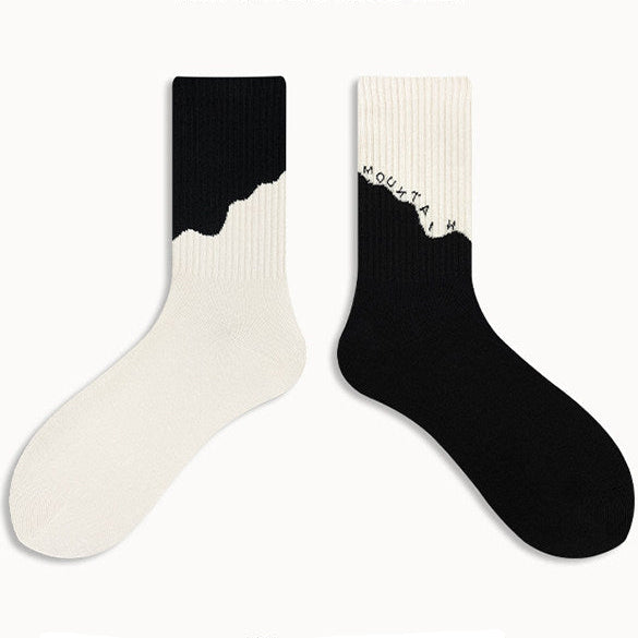 Black and white socks on a white background