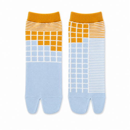 Pair of tabi socks with orange tops and blue patterns on a white background